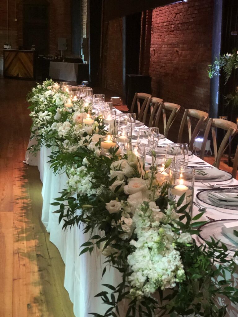Romantic wedding floral arrangements for ceremony and reception