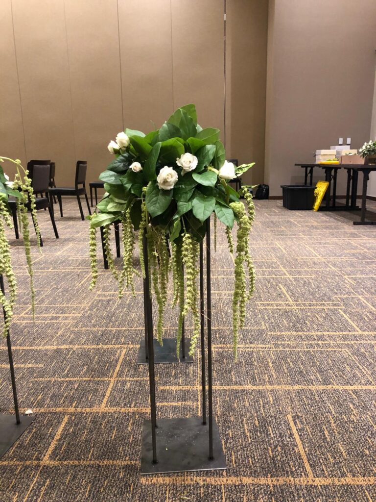 Daytime lunch event floral décor with fresh arrangements